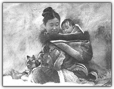 Nyla, Nanook's wife, and her baby at the trading post